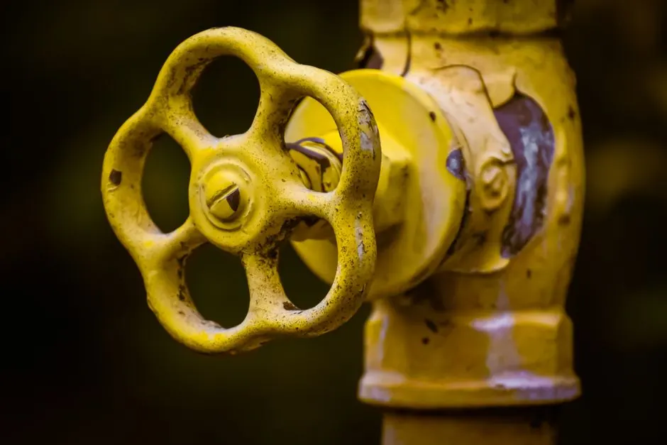 A round wheel-style isolation valve on a water pipe